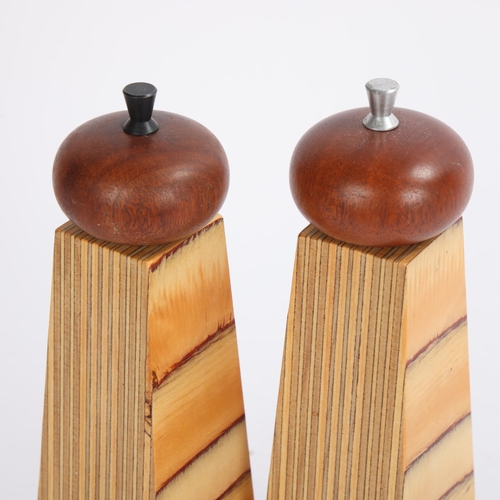 159 - A set of Danish teak and plywood salt and pepper grinders, marked Made in Denmark to base, height 23... 