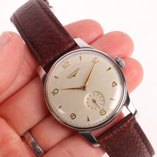 1016 - LONGINES - a Vintage stainless steel Calatrava mechanical wristwatch, ref. 5356, circa 1957, silvere... 