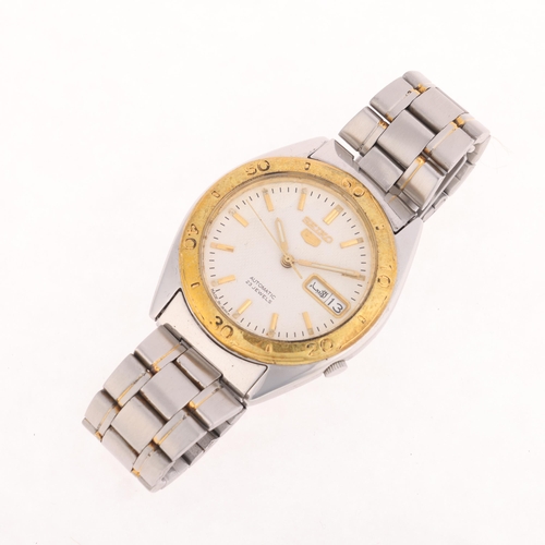 1019 - SEIKO 5 - a gold plated stainless steel automatic day/date bracelet watch, ref. 7S36-3250, white dia... 