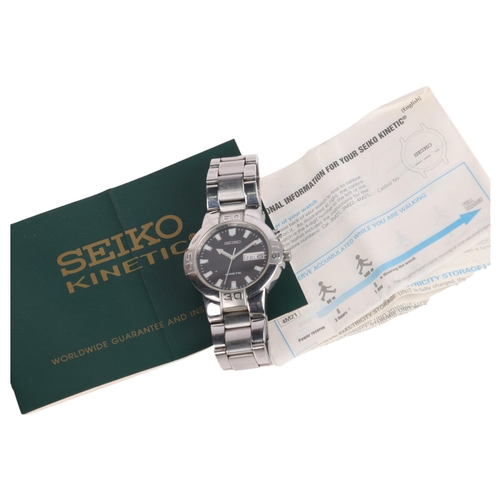 1024 - SEIKO - a stainless steel Kinetic automatic calendar bracelet watch, ref. 5M43-0E90, black dial with... 