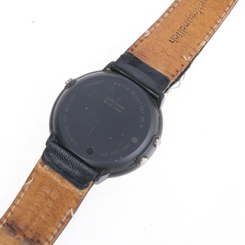 1025 - JUNGHANS - a black ceramic Mega Solar quartz wristwatch, ref. 018/1610, circa 1997, solar panel dial... 