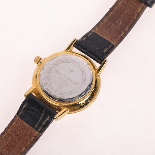 1059 - CHRISTIAN BERNARD - a lady's gold plated stainless steel quartz wristwatch, ref. 1390, white dial wi... 