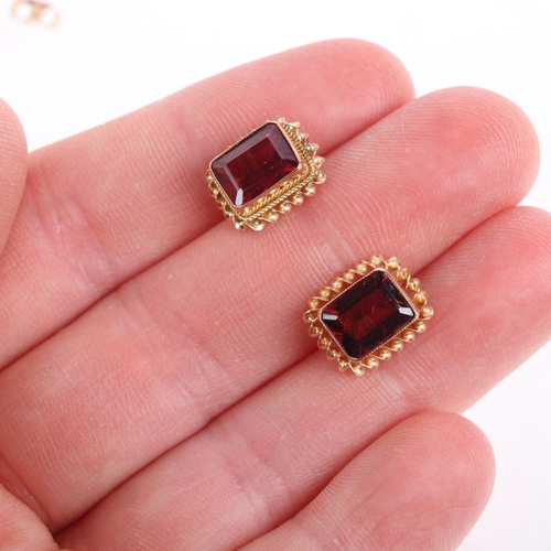 1120 - A pair of 9ct gold pink tourmaline stud earrings, each rub-over set with octagonal step-cut tourmali... 