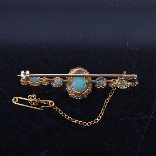 1123 - An Antique opal and diamond cluster bar brooch, the central oval cluster set with oval cabochon opal... 