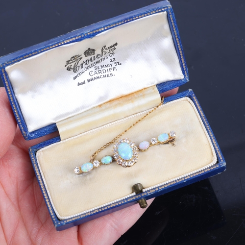 1123 - An Antique opal and diamond cluster bar brooch, the central oval cluster set with oval cabochon opal... 