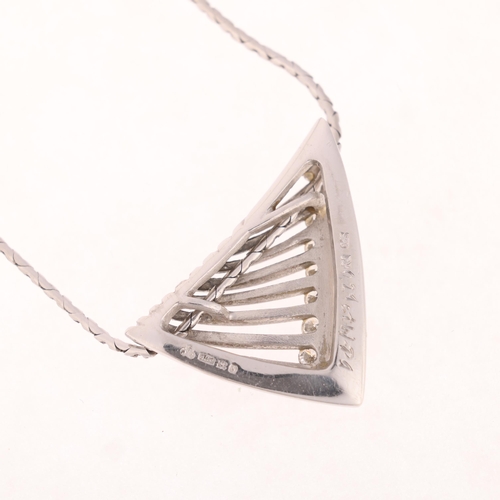 1129 - A platinum diamond openwork fold pendant necklace, by The Platinum Store, import hallmarks London 19... 