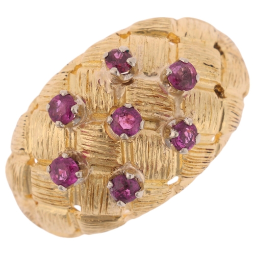 1140 - A Vintage 18ct gold ruby bombe ring, circa 1970s, textured and pierced lattice decoration set with r... 