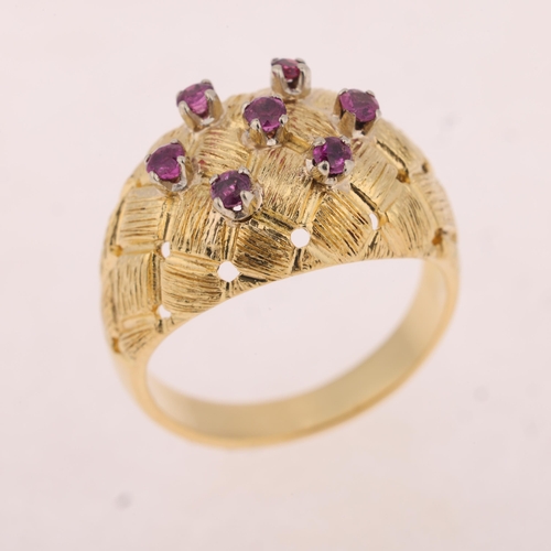 1140 - A Vintage 18ct gold ruby bombe ring, circa 1970s, textured and pierced lattice decoration set with r... 