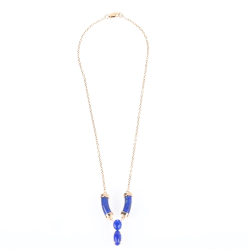 1148 - A 9ct gold lapis lazuli pendant necklace, set with polished curved cylinder lapis suspending graduat... 