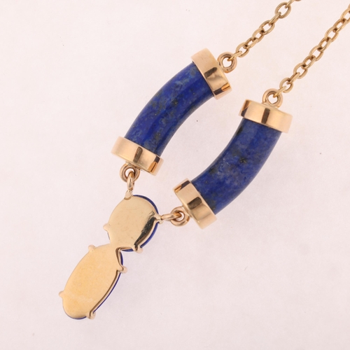 1148 - A 9ct gold lapis lazuli pendant necklace, set with polished curved cylinder lapis suspending graduat... 