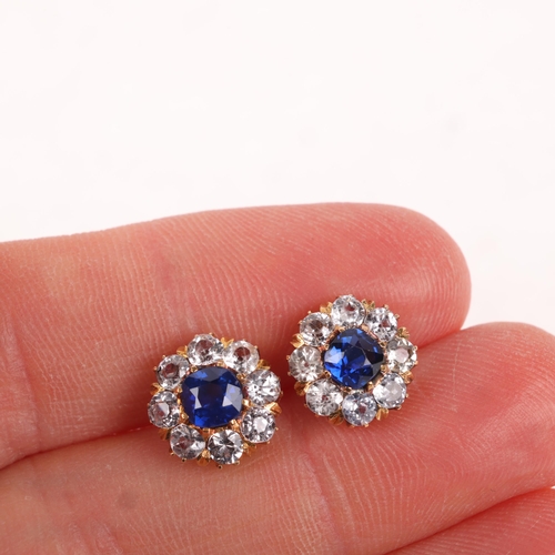 1151 - A pair of 18ct gold sapphire and white sapphire cluster stud earrings, each set with cushion-cut sap... 