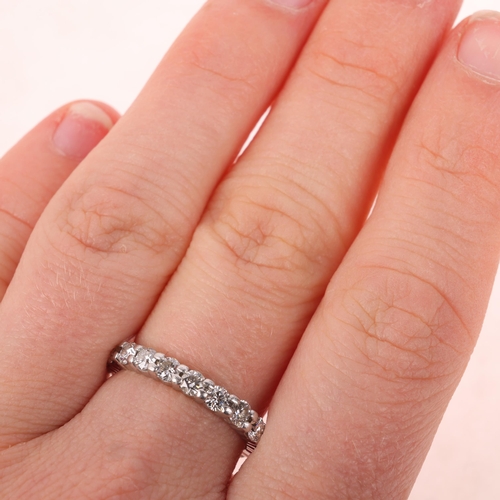 1152 - A platinum diamond full eternity ring, maker EJ, London 2014, set with modern round brilliant-cut di... 