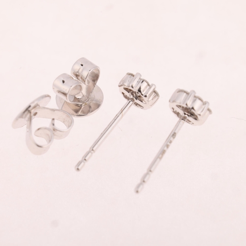 1155 - A pair of 18ct white gold diamond cluster stud earrings, set with modern round brilliant-cut diamond... 