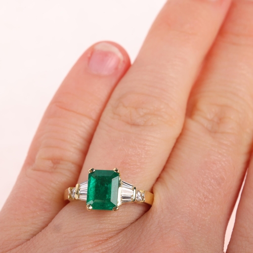 1161 - An 18ct gold emerald and diamond ring, claw set with 1.25ct octagonal step-cut emerald, flanked by t... 