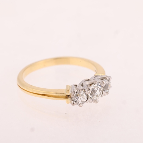 1162 - An 18ct gold three stone diamond ring, Birmingham 2000, claw set with old-cut diamonds, total diamon... 