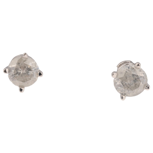 1163 - A pair of 14ct white gold 0.4ct single stone diamond stud earrings, each claw set with 0.2ct modern ... 