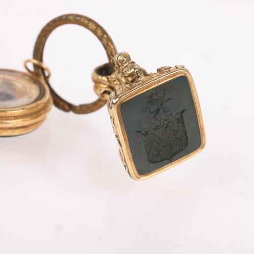 1167 - 2 Antique fobs on a split ring, comprising French 18ct gold combination bloodstone and compass fob, ... 