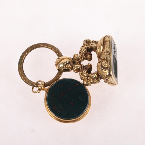 1167 - 2 Antique fobs on a split ring, comprising French 18ct gold combination bloodstone and compass fob, ... 