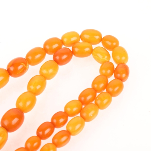 1172 - A Vintage single-strand graduated butterscotch amber bead necklace, beads ranging from 22.9-8.2mm, 6... 