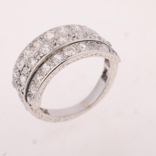 1179 - An Art Deco platinum diamond triple-row band ring, set with old-cut diamonds, total diamond content ... 