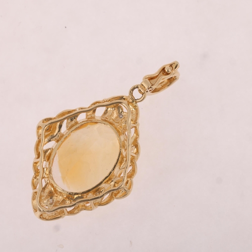 1182 - A 14ct gold citrine and diamond drop pendant, the lozenge frame claw set with oval mixed-cut citrine... 