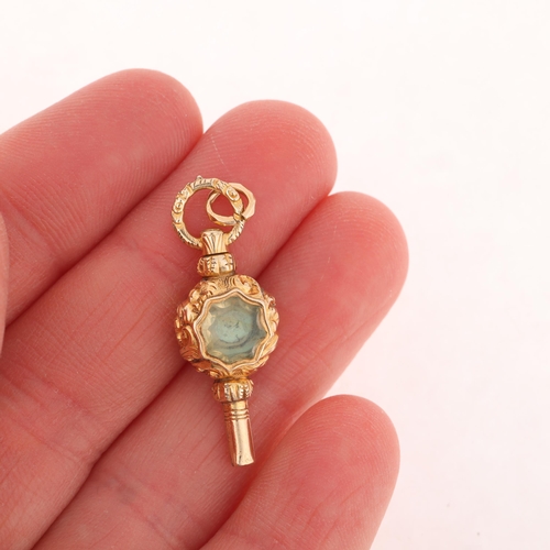 1215 - An Antique 9ct gold hardstone miniature pocket watch key fob, relief embossed foliate decoration, un... 