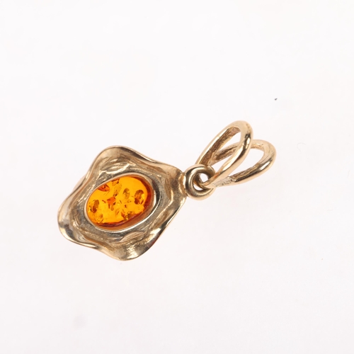 1221 - A 9ct gold single stone amber drop pendant, rub-over set with oval cabochon amber, 20.6mm, 1.1g