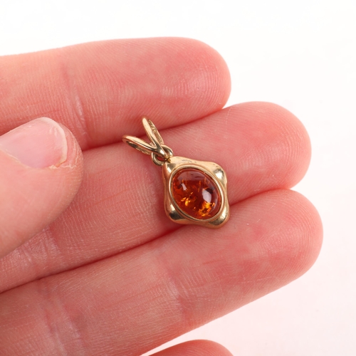 1221 - A 9ct gold single stone amber drop pendant, rub-over set with oval cabochon amber, 20.6mm, 1.1g