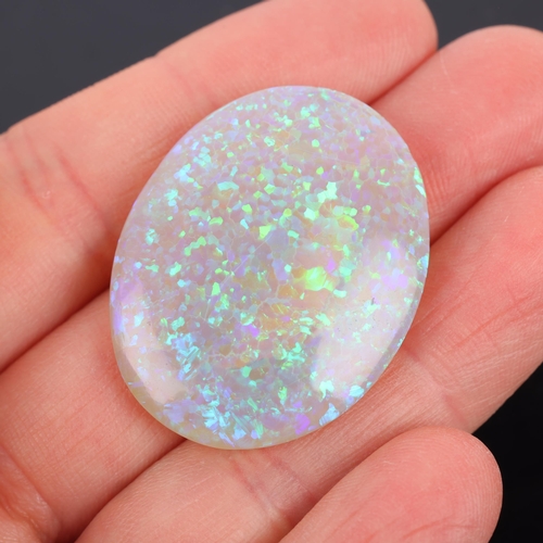 1222 - An unmounted 35ct oval double cabochon synthetic opal, 34.0 x 26.7 x 7.3mm, 7g