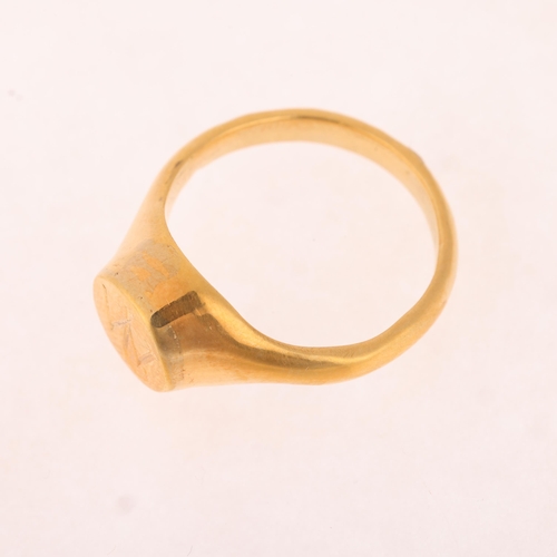 1226 - An 18ct gold signet ring, unmarked mount tests as 18ct, setting height 8.8mm, size P, 11.4g