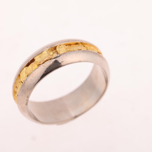 1233 - An 18ct gold 'Nugget' wedding band ring, maker NCK, London 2007, band width 6.1mm, size J, 5.2g