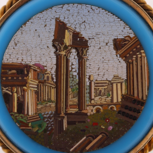 1243 - An Antique Italian Grand Tour 14ct gold micro-mosaic 'Roman Ruins' panel brooch, circa 1850, the rou... 