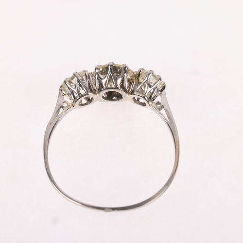 1247 - An 18ct white gold three stone diamond ring, claw set with round brilliant and transitional-cut diam... 