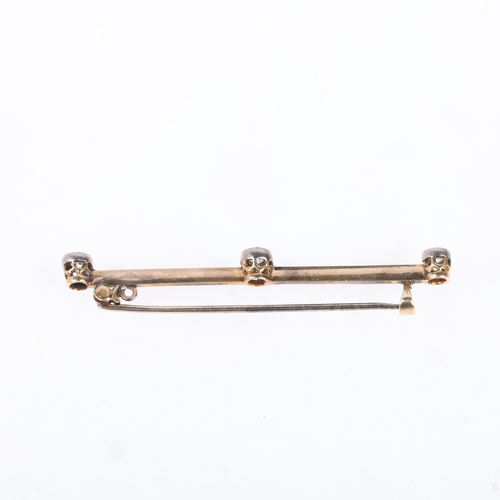 1249 - An Antique 14ct gold three stone diamond bar brooch, set with old European-cut diamonds, total diamo... 