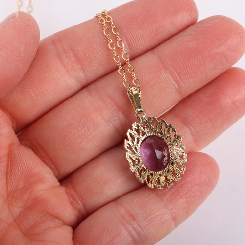 1254 - A 9ct gold amethyst pendant necklace, maker G&TJ, London 1975, claw set with oval mixed-cut amethyst... 