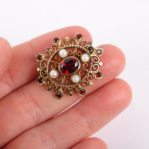 1260 - A 9ct gold garnet and pearl openwork brooch/pendant, maker BJ, London 1986, 29.8mm, 4.9g