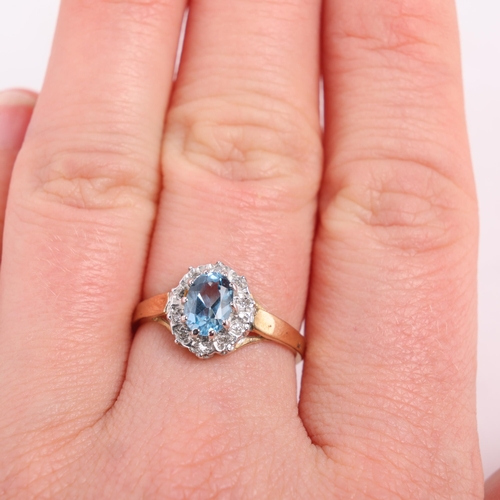 1265 - A 9ct gold blue topaz and diamond cluster ring, set with oval mixed-cut topaz and single-cut diamond... 