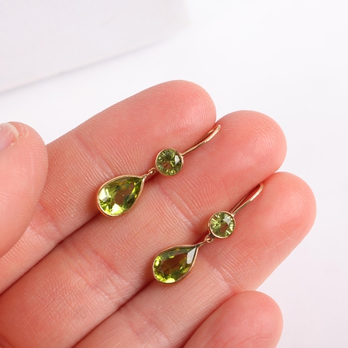 1267 - A pair of 9ct gold peridot drop earrings, set with pear and round-cut peridots, with shepherd hook f... 