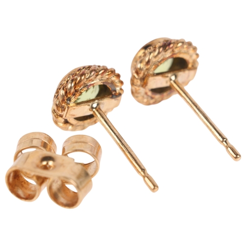 1277 - A pair of 9ct gold peridot stud earrings, with rope twist surround, 6.7mm, 1.2g