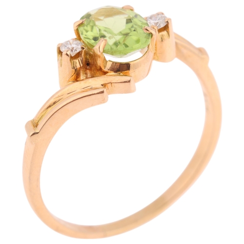 1278 - An 18ct gold three stone peridot and diamond crossover ring, set with oval mixed-cut peridot and mod... 