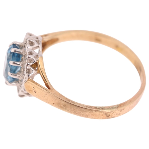 1295 - A 9ct gold blue topaz and diamond cluster ring, claw set with oval mixed-cut topaz and single-cut di... 