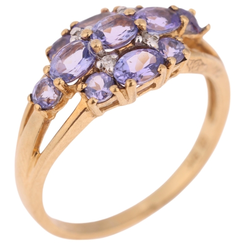 1308 - A 9ct gold tanzanite and diamond dress ring, setting height 9.1mm, size N, 2.3g