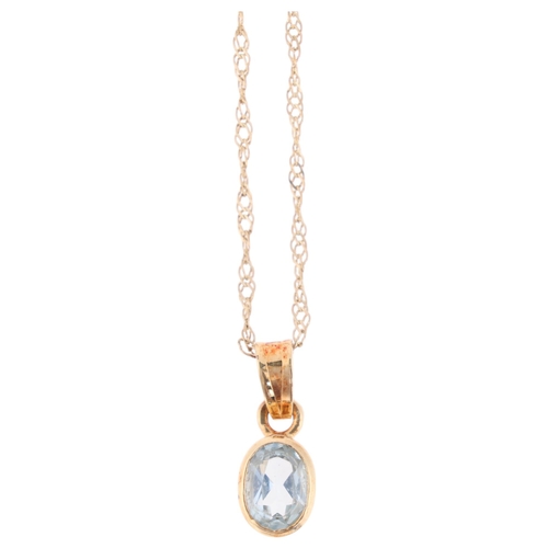 1313 - A 14ct gold blue topaz drop pendant necklace, on 9ct Prince of Wales link chain, pendant 15.9mm, cha... 