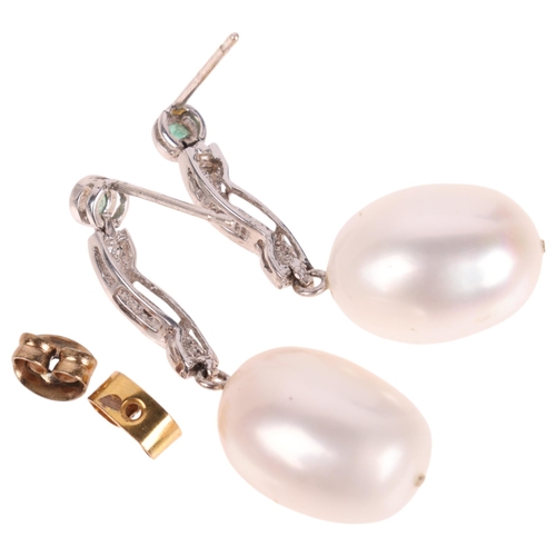 1315 - A pair of 9ct white gold pearl emerald and diamond drop stud earrings, unmarked mount tests as 9ct, ... 