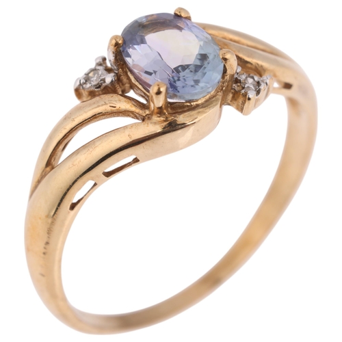 1329 - A 9ct gold tanzanite and diamond dress ring, set with oval mixed-cut tanzanite and single-cut diamon... 