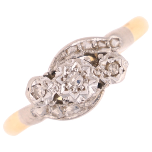 1337 - An 18ct gold three stone diamond crossover ring, platinum-topped illusion set with round-cut diamond... 