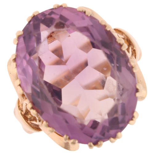 1354 - A 9ct gold amethyst dress ring, maker N Brothers, set with oval mixed-cut amethysts and ribbon bow s... 