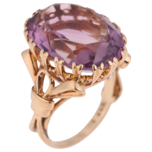 1354 - A 9ct gold amethyst dress ring, maker N Brothers, set with oval mixed-cut amethysts and ribbon bow s... 