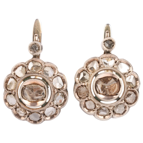 1355 - A pair of diamond flowerhead cluster drop earrings, set with rose-cut diamonds, unmarked mount tests... 