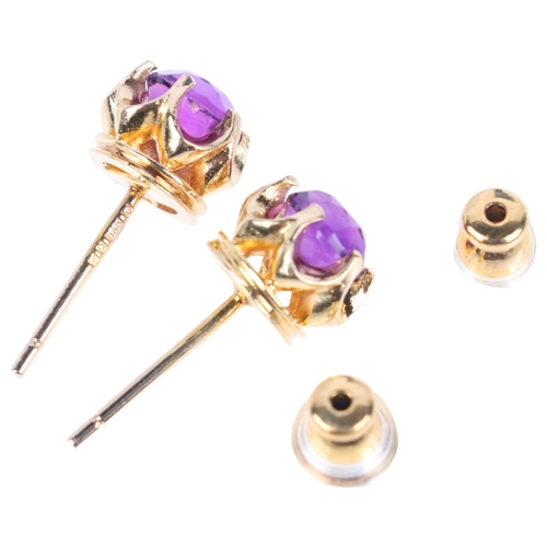 1362 - A pair of 9ct gold amethyst stud earrings, maker AC Co, London 1977, 8.3mm, 2.5g